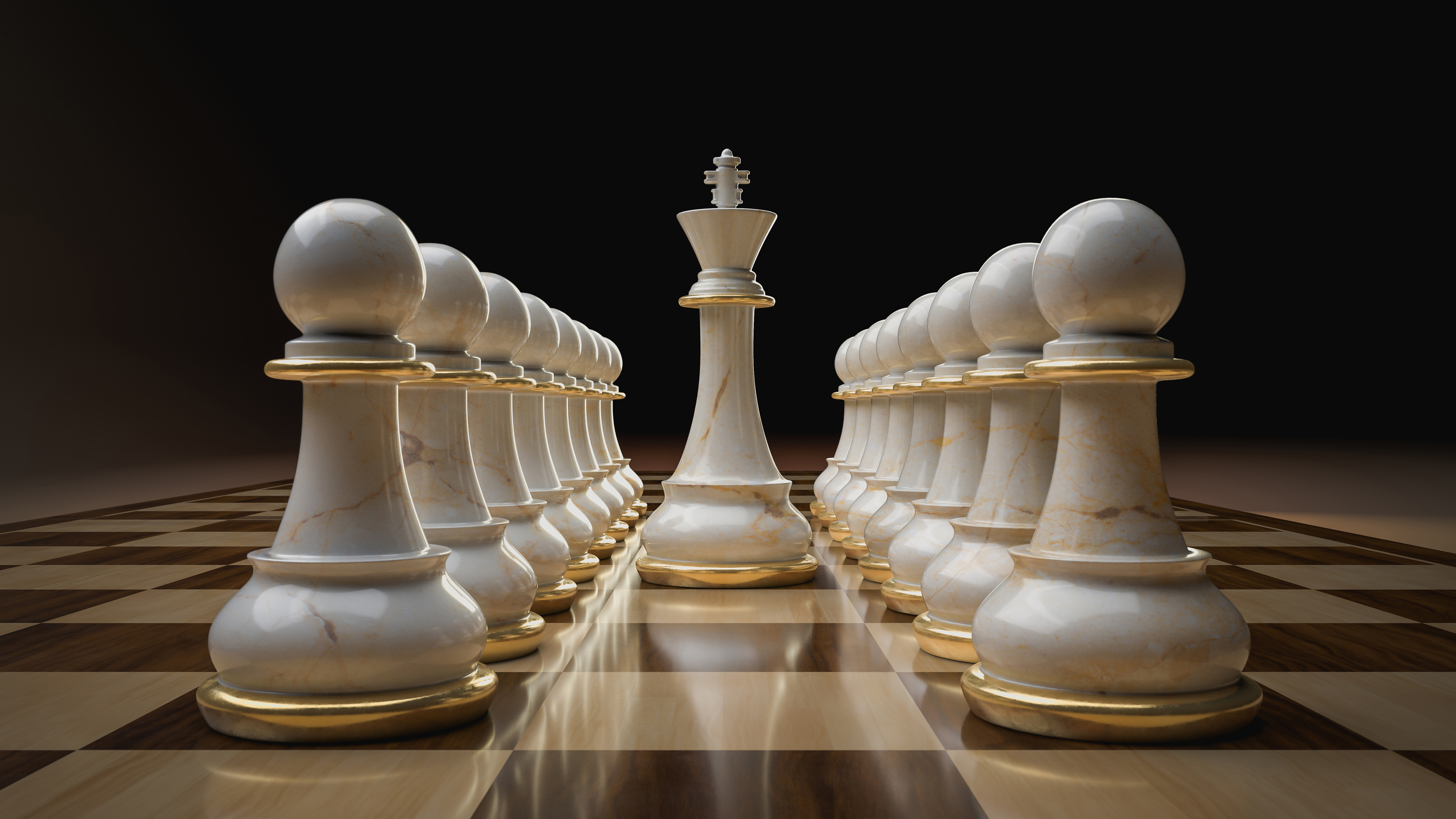 white and gold chess pieces